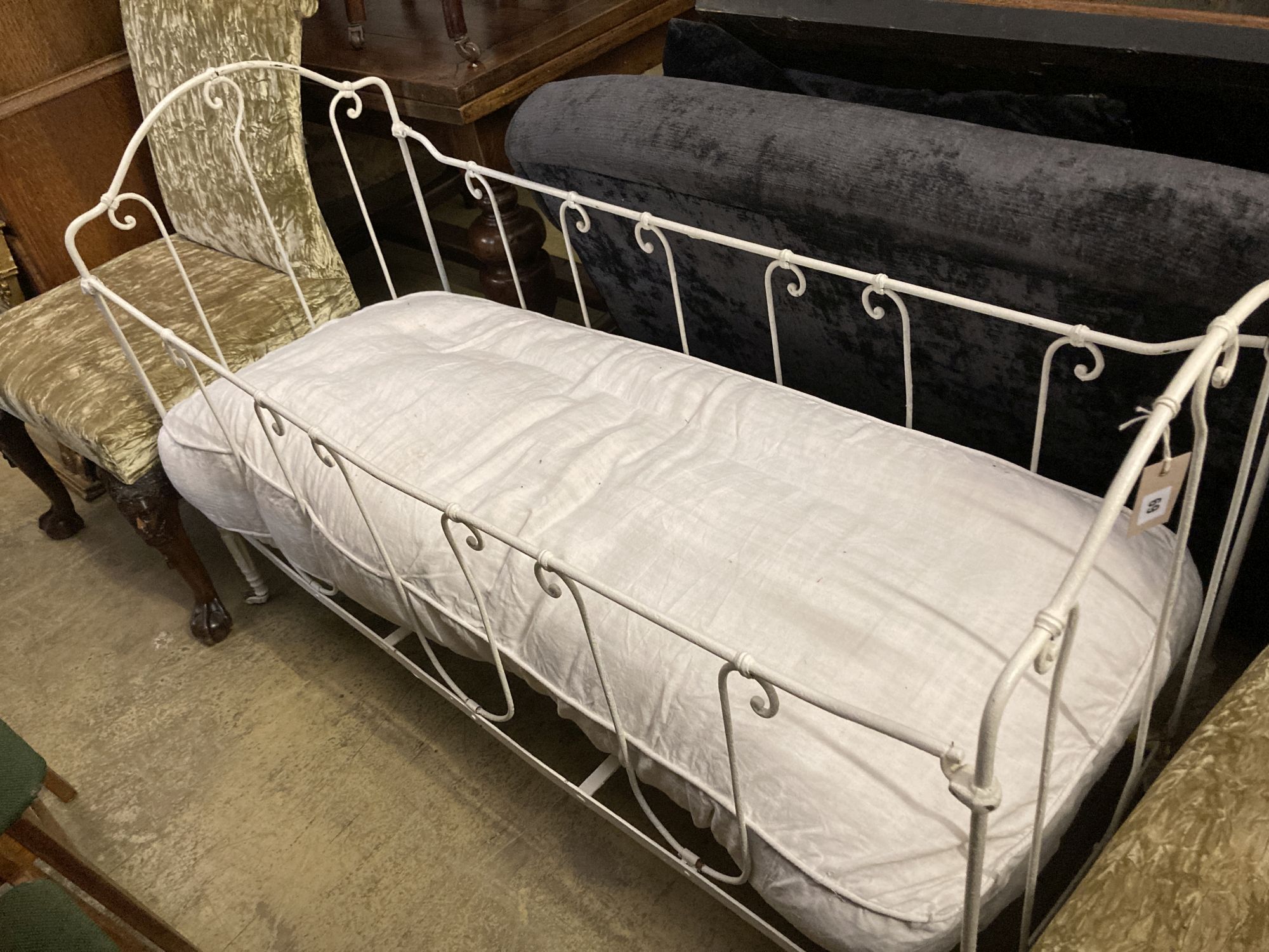 A 19th century French painted wrought iron crib, length 140cm, depth 59cm, height 90cm